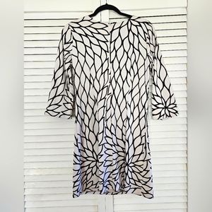 Flattering and fitted dress that you can't live without.